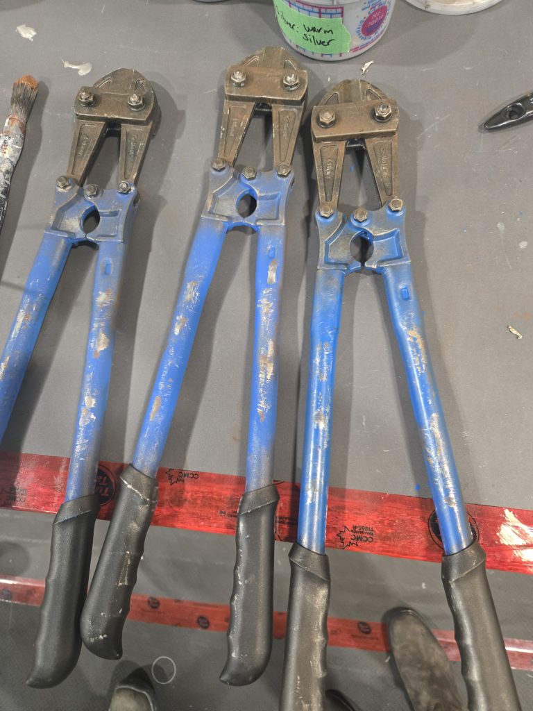Original bolt cutters with matching soft stunt-prop replicas