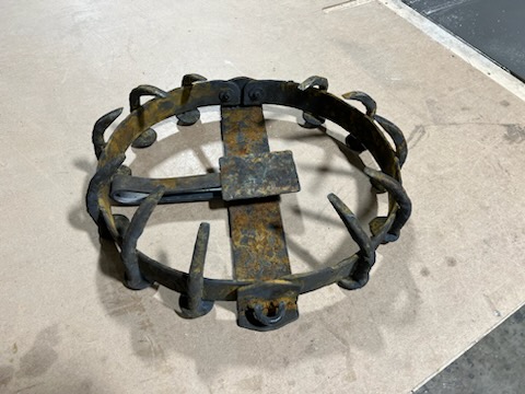 Aged stunt-safe bear trap prop for film and television